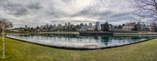 Panoramic overview of Vancouver from Granville Island on cloudy day