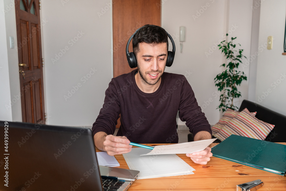 Student at home reviewing homework and lesson summaries. Student at home reviewing homework and lesson summaries.
