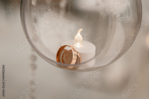 Wedding rings in a glass ball