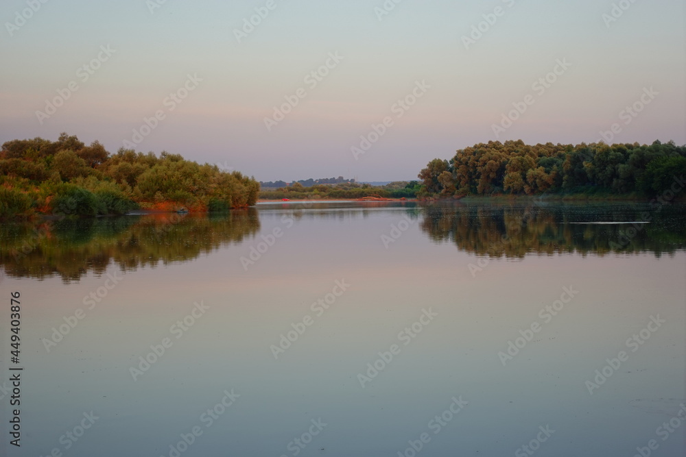 Quiet beautiful sunset on the river in summer autumn fall in Europe, Ukraine, Yezupil. River Dnister 4