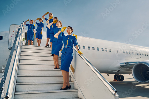Fotografía Six air hostesses saluting before the take-off