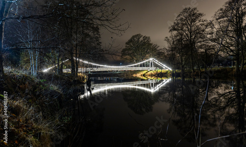 A pedestrian bridge over the Lagan river in Osudden, Värnamo, Sweden photo