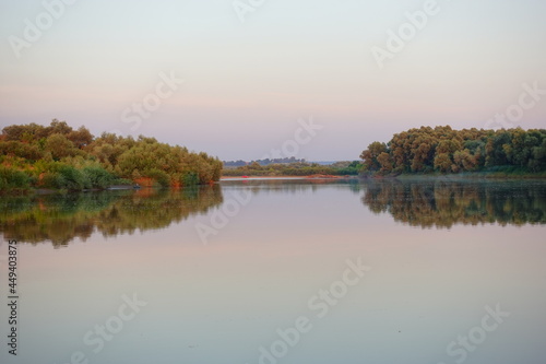 Quiet beautiful sunset on the river in summer autumn fall in Europe, Ukraine, Yezupil. River Dnister 5