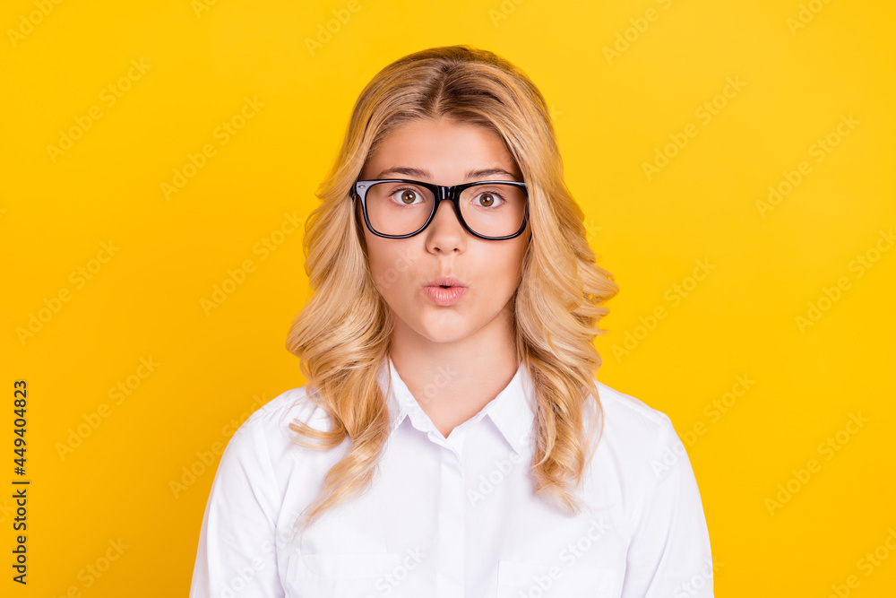 Photo of excited schoolgirl sale omg reaction look camera wear specs white shirt isolated yellow color background