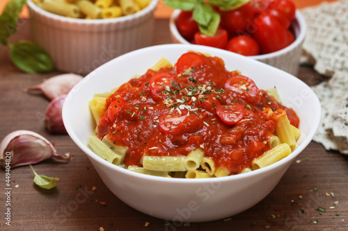 Homemade pasta with tomato sauce.