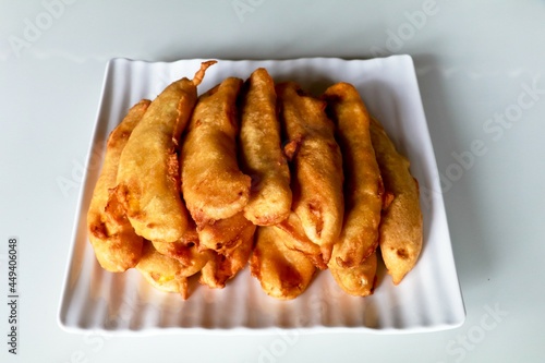 Pazhampori, a traditional Kerala tea time snack made of maida and sliced ripe banana, selective focus