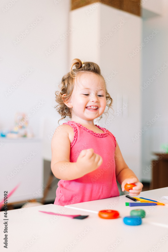 child girl draws with colored pencils child girl draws with colored pencils