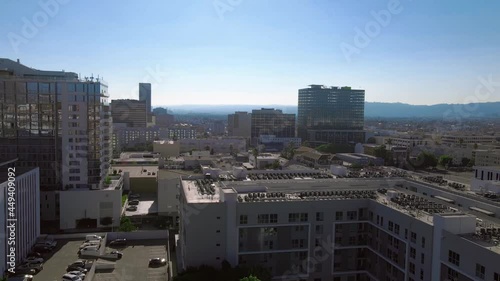 Panoramic aerial view of Central Courthouse on a sunny day, drone shot of Lafayette Park area, Los Angeles, California, USA
 photo