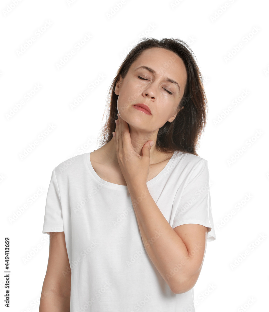 Mature woman doing thyroid self examination on white background Mature woman doing thyroid self examination on white background