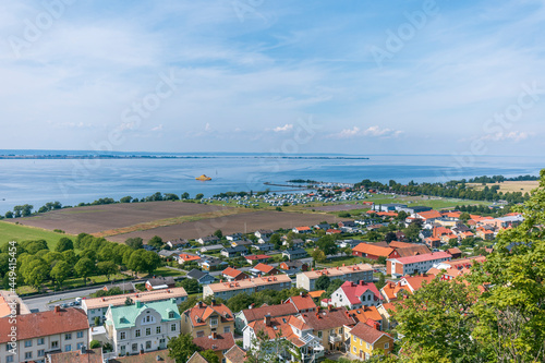 The town of Gränna in Sweden as seen from the Gränna mountain with Lake Vättern and Vising island in the horizon