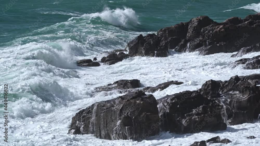 sea waves crash on the rocks of the coast creating an explosion of water sea waves crash on the rocks of the coast creating an explosion of water