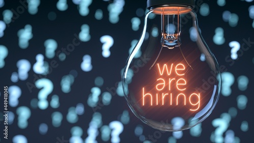 Fotografie Light bulb on announcing: we are hiring.