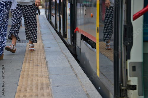 Wallpaper Mural tram arriving at its station to pick up passengers. Travel concept, public transport, renewable energy and non-polluting. Torontodigital.ca