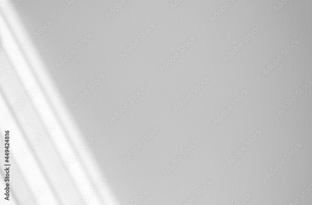 Obraz premium Window shadow drop on white wall background