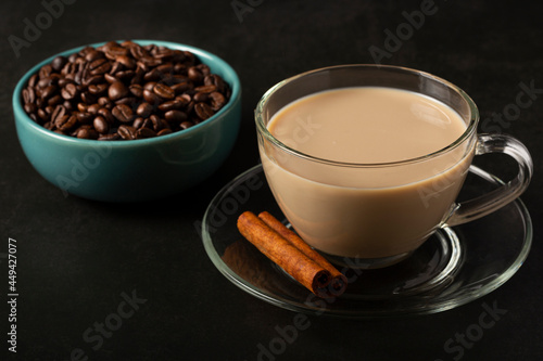 Cup of coffee with creamy milk.