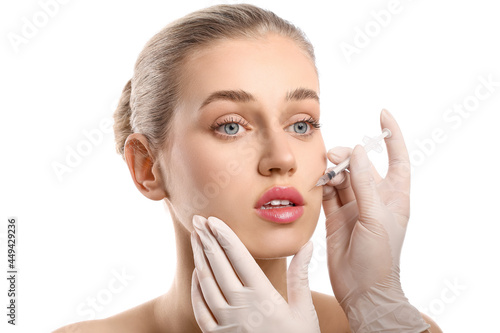 Young woman receiving fille...