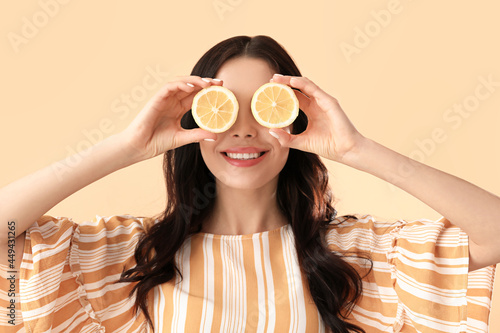 Funny young woman with lemo...