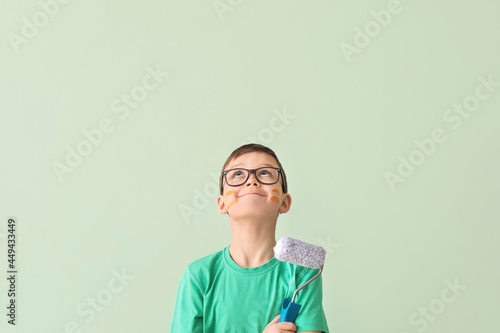 Cute little boy with paint ...