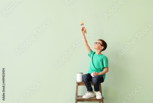 Cute little boy with paint ...