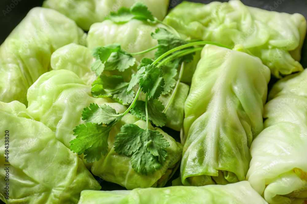 Uncooked cabbage rolls as background, closeup Uncooked cabbage rolls as background, closeup