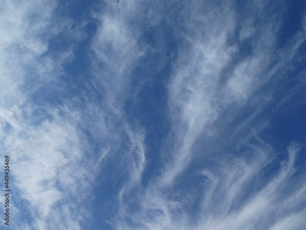 Interesting clouds on the blue sky background Interesting clouds on the blue sky background