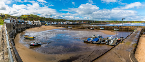 A panorama view across the inner harbour at the town of Cullen, Scotland on a summers day
