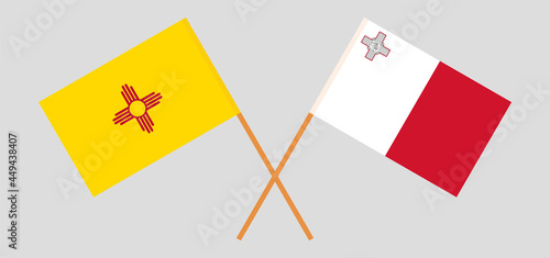 Crossed flags of the State of New Mexico and Malta. Official colors. Correct proportion