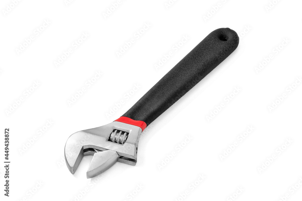Small adjustable wrench with black handle. Hand tool. Close-up. Isolated on a white background. Small adjustable wrench with black handle. Hand tool. Close-up. Isolated on a white background.