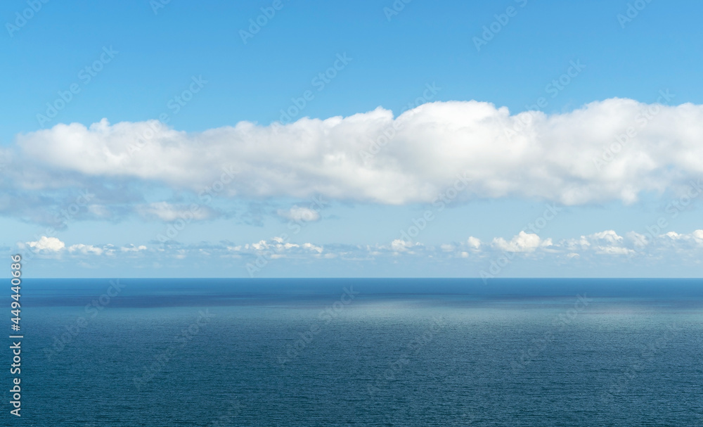 Beautiful snow-white clouds over the sea. The Black Sea coast of Crimea.Yalta. Beautiful snow-white clouds over the sea. The Black Sea coast of Crimea.Yalta.