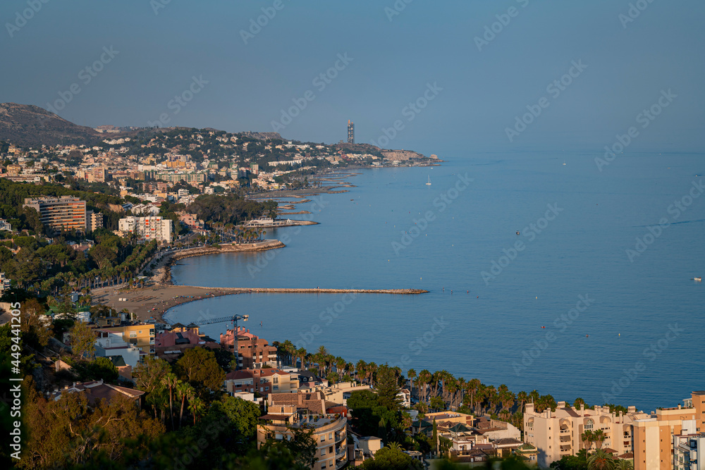 Views of Malaga city during sunset on a sunny summer day