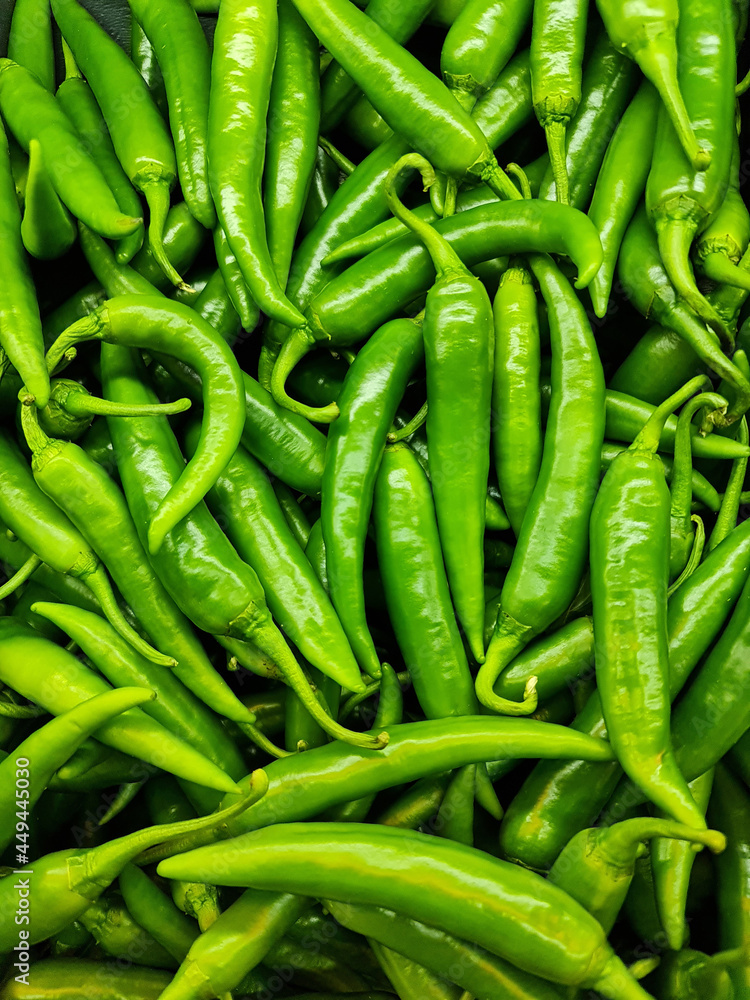 Fresh green chili. for sale in market. Many number. Green chili background. Fresh green chili. for sale in market. Many number. Green chili background.