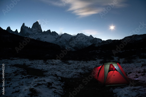 Night camping at the base of Cerro Fitz Roy under the moonlight. El Chalten Patagonia Argentina. Freedom adventure concept
