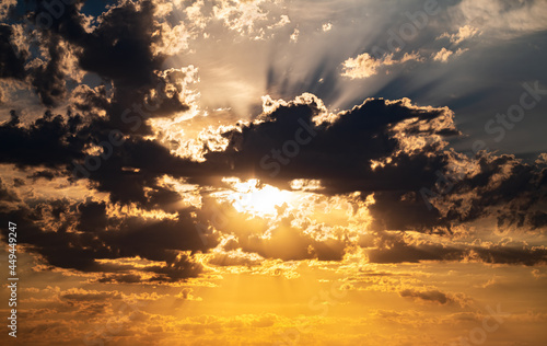 Photography Image of sunset rays shinning through clouds