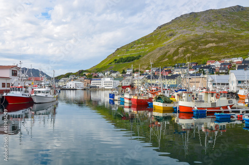 Honninsvag, Norway with fishing boats in quiet village town photo