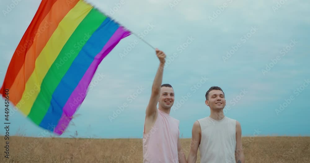 Portrait of Two Happy Guy Gay Waving LGBT Rainbow Flag at the Field ...