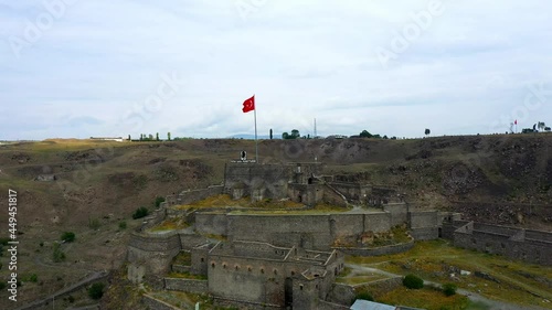 The Castle of Kars is a former fortification located in Kars, Turkey. It is also known under the name Iç Kale. It was built in 1153 by Firuz Akay Commissioned by Sultan Melik Izzeddin Saltuk II. The o photo