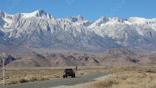 A car driving in Owens Valley, California photo