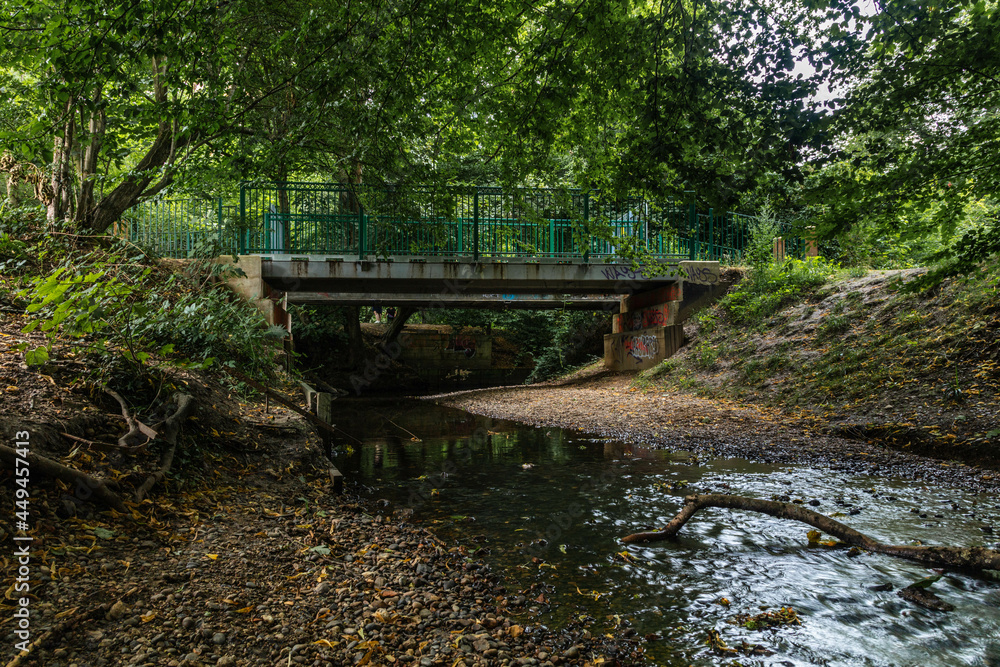 A pedestrian bridge over the Dollis Brook along Dollis valley green walk.