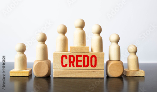 Word credo. Wooden small cubes with letters isolated on white background with copy space available.
