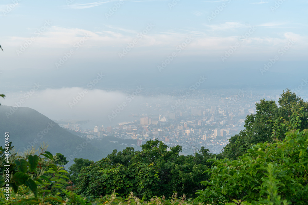Fototapeta premium 北海道函館市の函館山を登山する風景 A view of climbing Mount Hakodate in Hakodate, Hokkaido. 