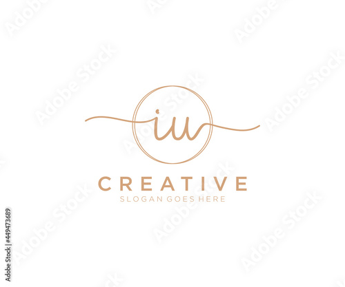 initial IU Feminine logo beauty monogram and elegant logo design, handwriting logo of initial signature, wedding, fashion, floral and botanical with creative template.