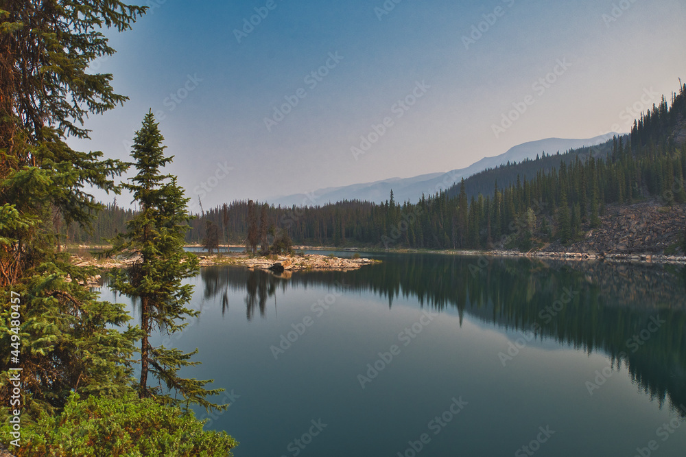 Symmetry mirror images in Horseshoe lake. Jasper AB Canada
Symmetry mirror images in Horseshoe lake. Jasper AB Canada