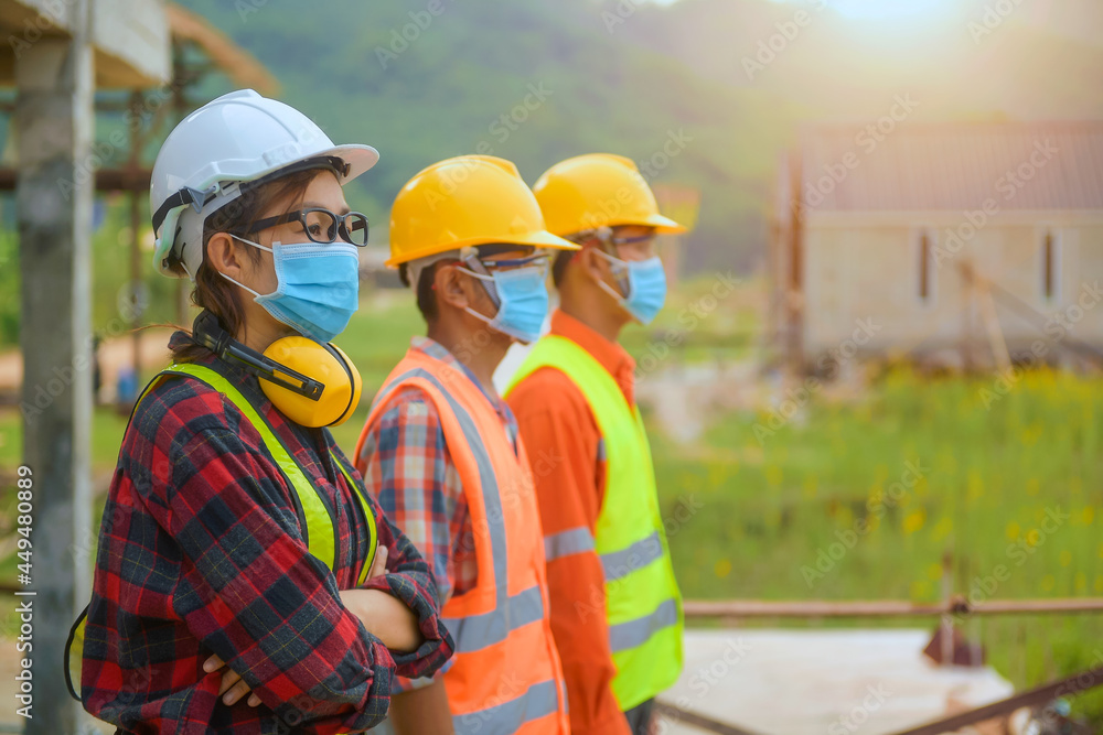 Workers wear a quarantine face mask Workers wear a quarantine face mask