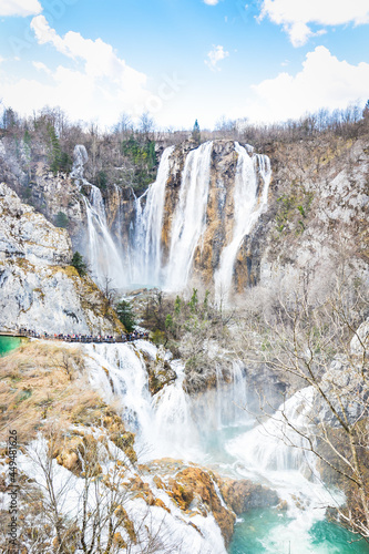 Beautiful Waterfalls at Plitvice Lakes National Park with cloudy blu sky (natural unesco world heritage site)