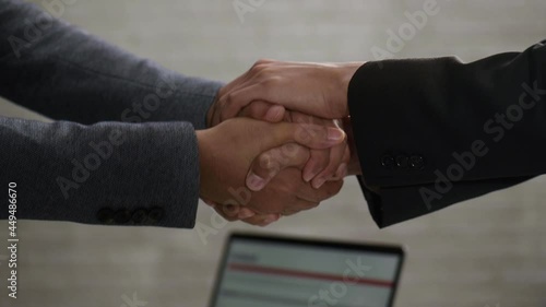 Two business people shaking hands successful corporate partnership.manager of project partner handshake happy client customer investor at business meeting success. Couple hand hold and shake of trust.