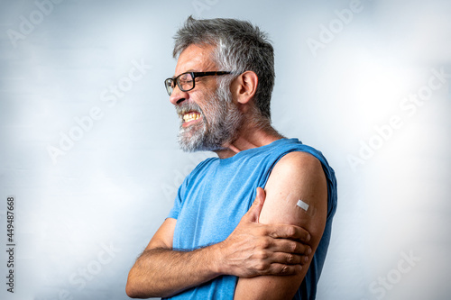 Murais de parede adult male suffering after vaccination, rare case of adverse reaction, painful e