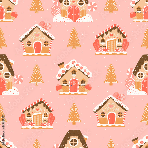 Christmas gingerbread houses and trees in cartoon style on pink background seamless pattern with snowflakes, colourful new year ornament for wrapping paper or fabric design