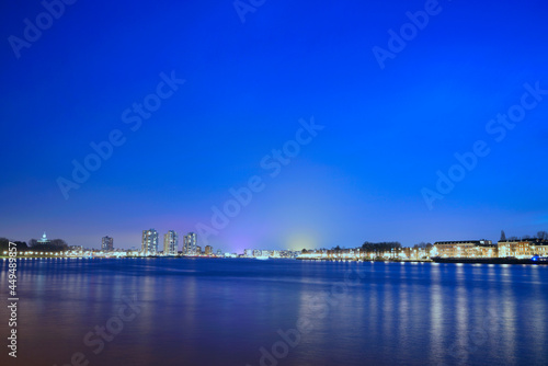 Distant view of a coastal city's cityscape at night © Wheat field