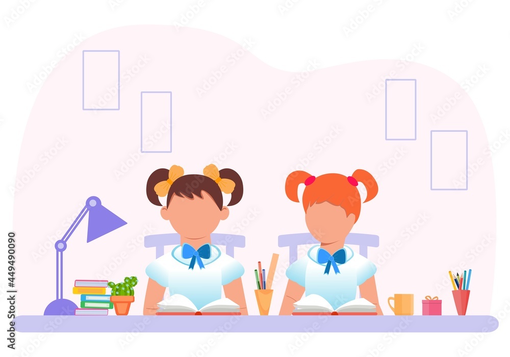 School and education. Children are sitting at a desk with a textbook. Back to school for textbooks and theoretical, practical assignments. School and education. Children are sitting at a desk with a textbook. Back to school for textbooks and theoretical, practical assignments.