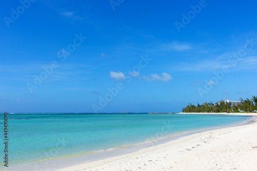 Beautiful beach under blue sky, tourist attraction